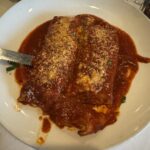 Hearty Italian braised meat dish in tomato sauce at Agatina's restaurant in Monroe County