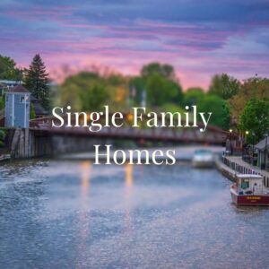 Fairport NY single family homes for sale along the Erie Canal at sunset