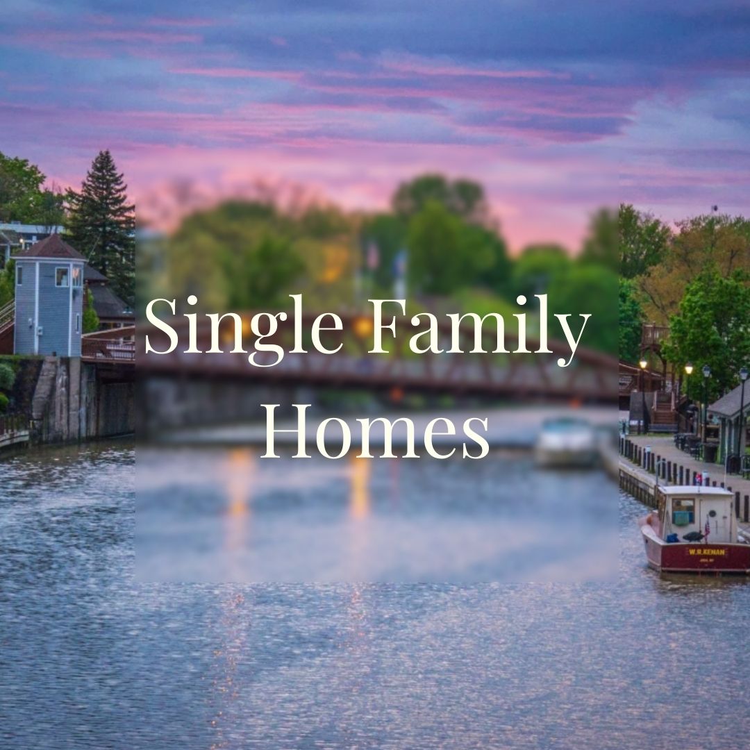 Canal view with single family homes